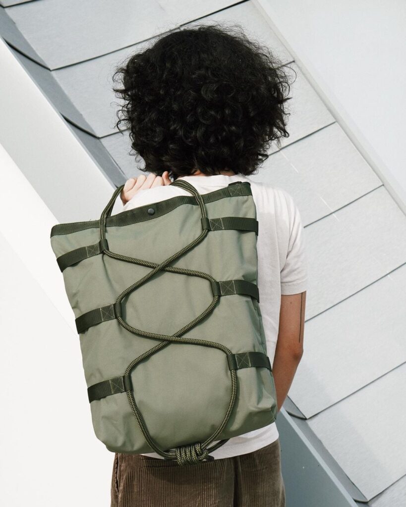 Army green tote bag with criss cross details