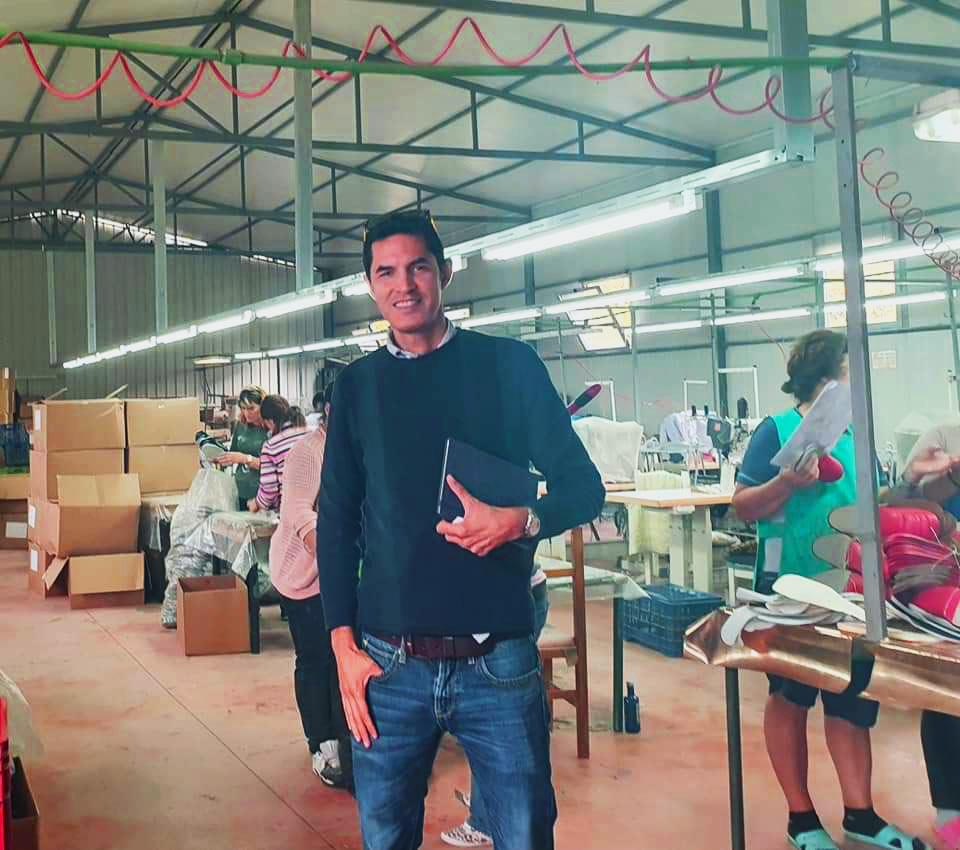 Deepwear CEO overseeing the production in a garment factory 
