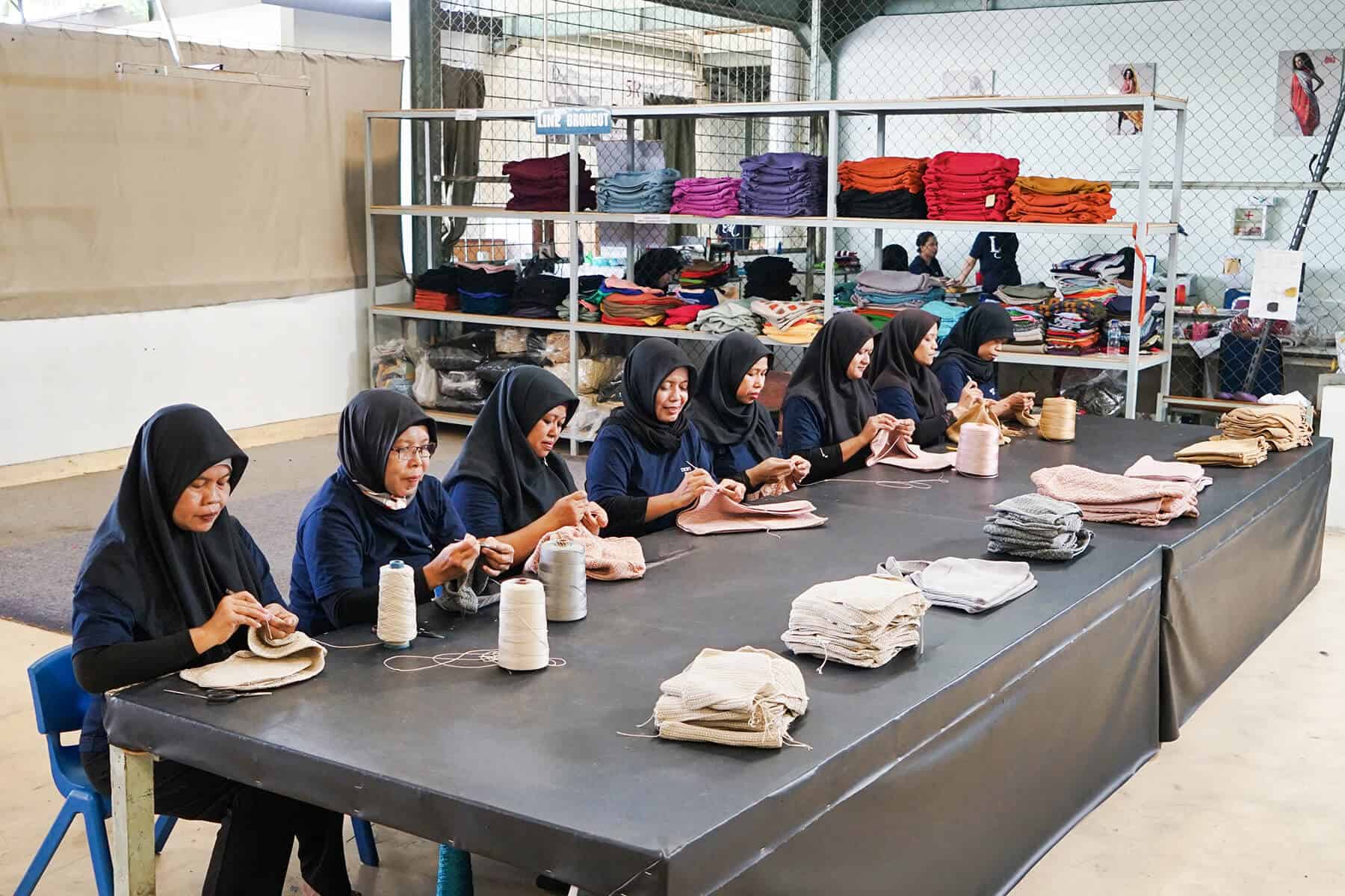 Women working in garment knitting factory