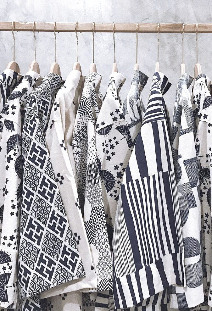 Samples of Monochromatic jackets hanging on a rack